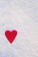 Three red felt hearts on snow, Valentine's Day. Copy space for text. Snowflakes on hearts. Valentines day, love concept. White background