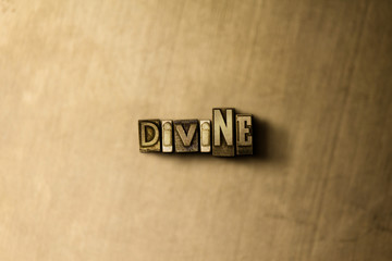 DIVINE - close-up of grungy vintage typeset word on metal backdrop. Royalty free stock - 3D rendered stock image.  Can be used for online banner ads and direct mail.