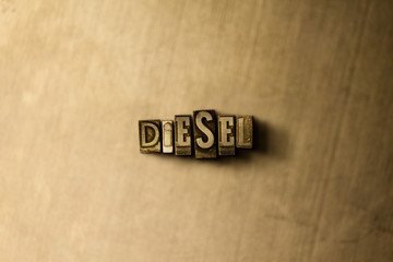 DIESEL - close-up of grungy vintage typeset word on metal backdrop. Royalty free stock - 3D rendered stock image.  Can be used for online banner ads and direct mail.