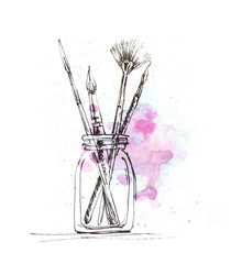 Artist brushes in glass