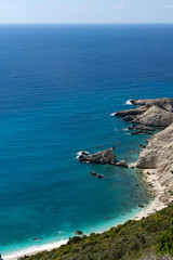 Rocks and blue waters near Petani Beach, Kefalonia, Ionian Islands, Greece