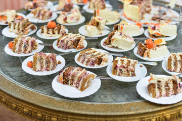 Catering service plate .appetizing sandwiches on plastic sticks rangeSandwiches
