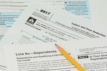 US IRS Form 1040 and 8917 worksheet