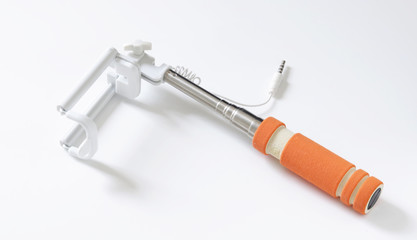 modern selfie stick on the white
