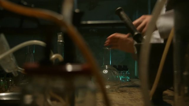 Strange scientist prepares a potion