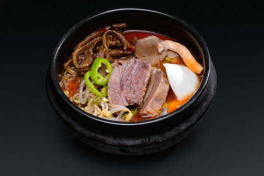 Korean soup with meat and mushrooms