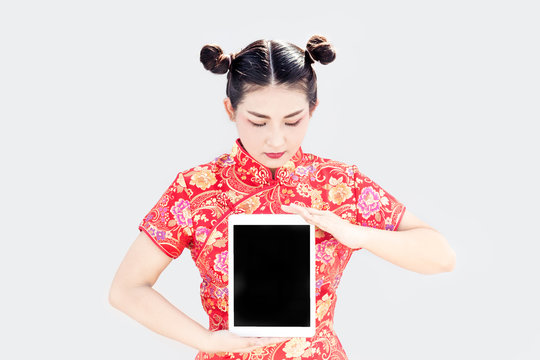 chinese lady show tablet on white