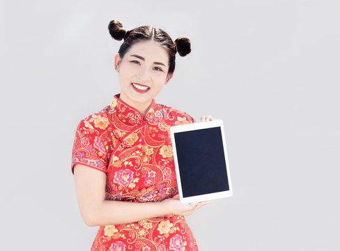 chinese lady show tablet on white