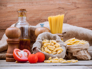 Italian food concept various pasta with olive oil flavored and s