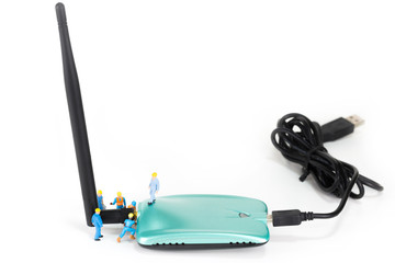 Selective focus of miniature engineer and worker plugin antenna of wireless router as technology,...