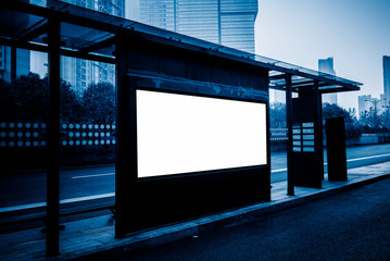 Blank billboard at bus stop in city of China.