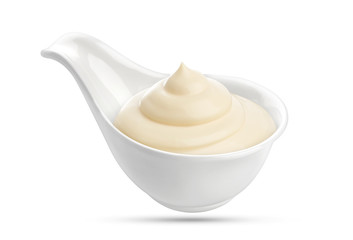 Mayonnaise sauce in bowl isolated on white background with clipping path