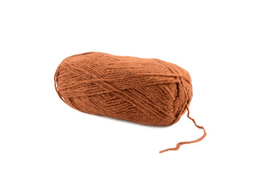 Brown yarn clew closeup isolated on white