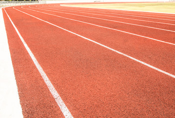 Red racetrack for competition in the stadium.