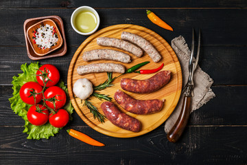 Raw sausage with spices and  vegetables