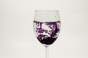 wine glass with water and food color