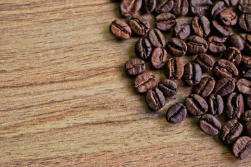 Coffee beans on a wooden table