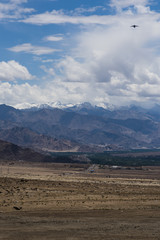 Ladakh landscape; barren cold desert of Ladakh with Himalayan mountains in the background.