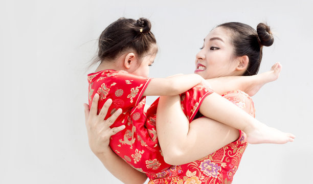 asian chinise family happy in red dress