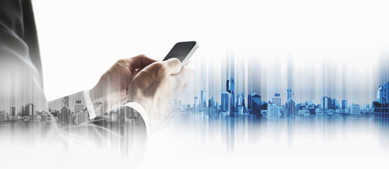 Businessman using smartphone with city, business communication technology concepts