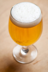 Light beer on wood