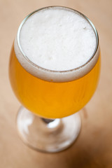 Light beer on wood