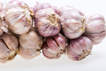 String of garlic isolated on white background