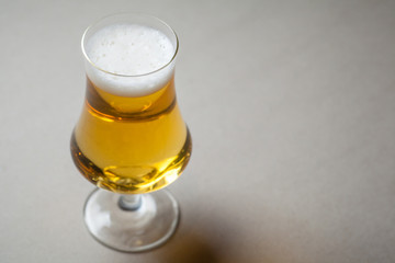 Light beer on gray