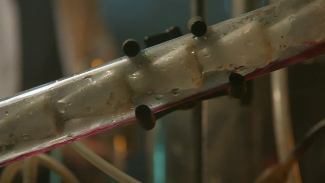 Liquid filtration in a glass tube, the gas comes out