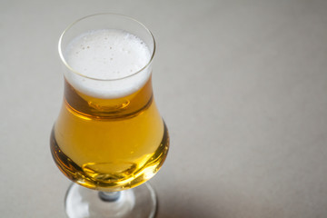 Light beer on gray