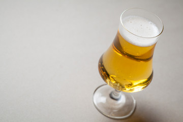 Light beer on gray
