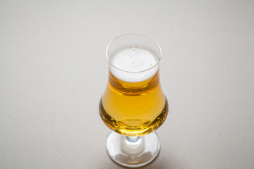 Light beer on gray