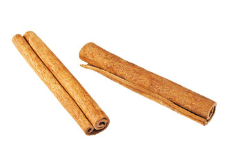 Two cinnamon sticks on white background