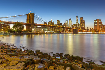 Manhattan skyline at sunset with Brooklyn Bridge, New York City