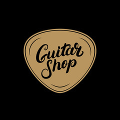 Golden Guitar shop hand written lettering logo, emblem, label, badge with plectrum.