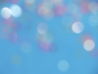 красивые цветные блики на синем фоне      