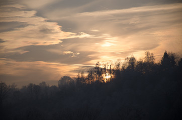 Frozen landscape under sunset