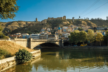 Fototapeta premium Kura river, Narikala castle, funicular and Old Town of Tbilisi. Georgia