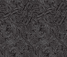 Seamless background pattern. White openwork ornament on black. Vector illustration.