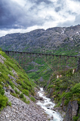 Fototapeta premium Deadhorse Gulch retired train bridge in the Yukon Territory of Alaska built during the gold rush