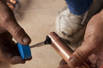preparations for soldering copper pipes - obrazy, fototapety, plakaty