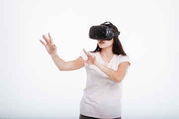 Young lady wearing virtual reality device