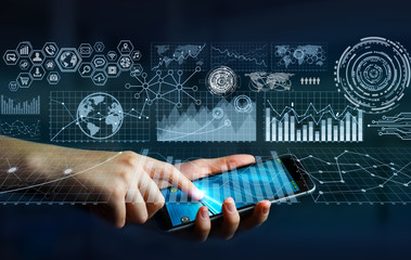 Businesswoman using digital mobile phone charts interface