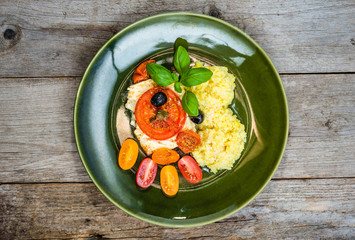 Healthy food plate, top view. Vegetables with couscous, dietary vegetarian dish, cooking concept