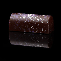 chocolate candy on black background