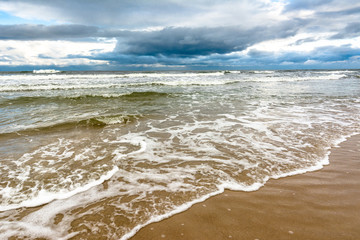 Fototapeta na wymiar Stormy sea, landscape with dramatic sky and cloud over horizon