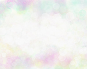 Abstract white bokeh on colorful background.