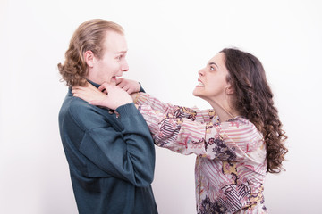 Woman choking her husband, angry wife, domestic abuse