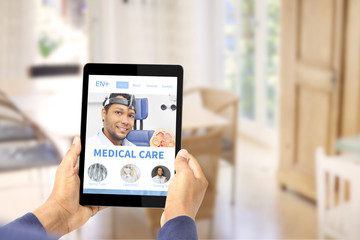 Fototapeta na wymiar Device Displaying Online Health Care Website 