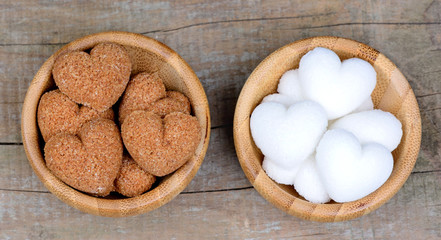 Hearts of sugar in a bamboo bowls on table